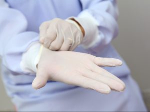 According to the NSW Department of Health it's best to wear gloves when waxing.