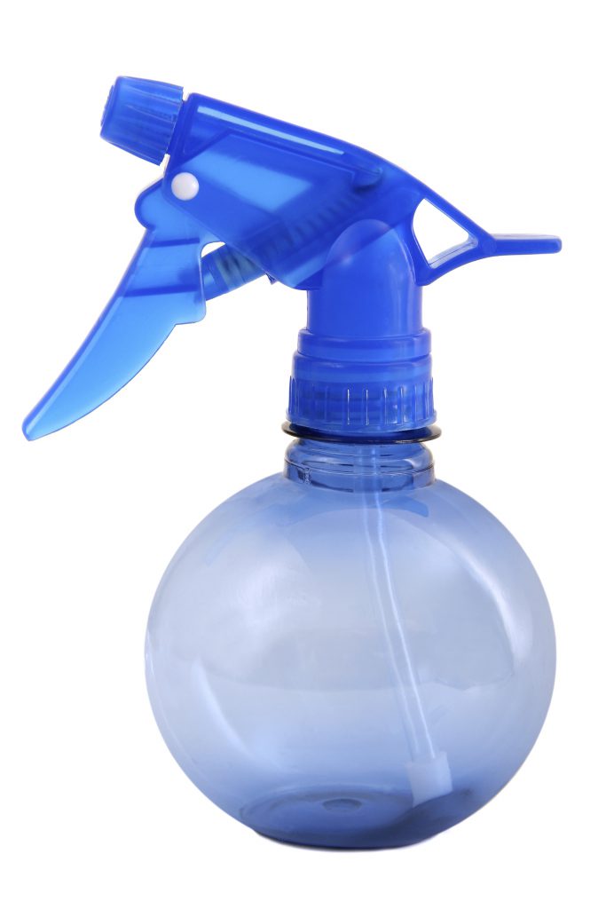 Decanting your massage oil into a spray bottle will cut down on wastage and mess. 