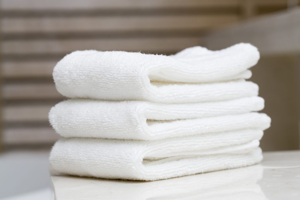 Keep towels on the thinner side to cut down on your washing and drying time.