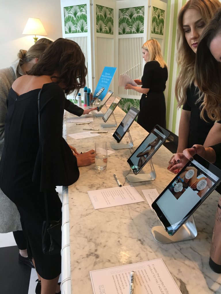 Checking out the St Tropez Tan Finder at the St Tropez's press launch for the brand's re-formulated range of professional and consumer products.