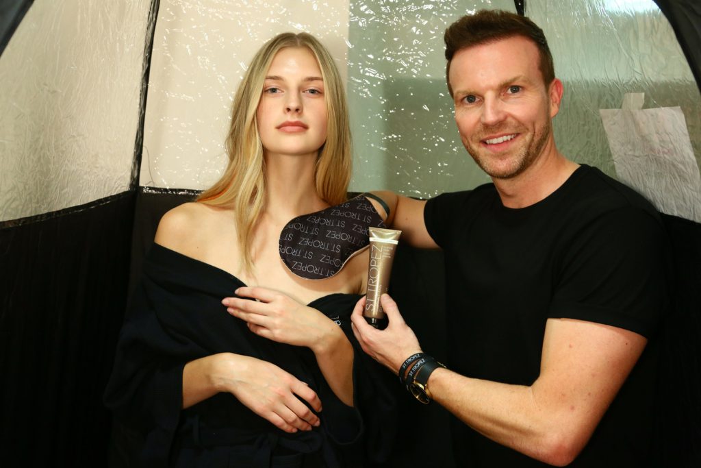 Michael Brown St Tropez Skin Finishing Expert and makeup artist goes backstage to perfectly tan the models at Temperley, London Fashion Week. 