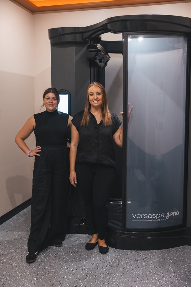 Jessica Leonard and Ashleigh Potocki with the VersaSpa Pro Tanning Machine